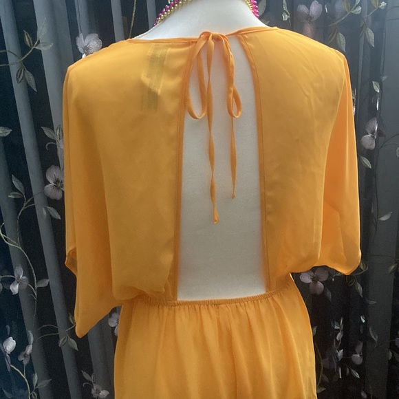 Sexy and flirty swimsuit coverup - Picture 3 of 5